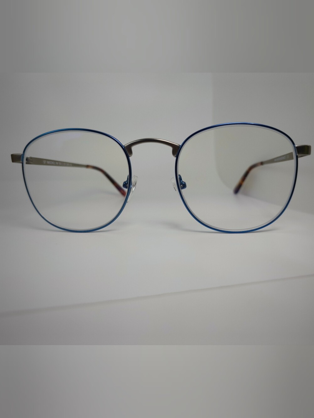 St Michael. Blue Metallic Metal Front Eyewire, Brushed Silver Bridge Temples.